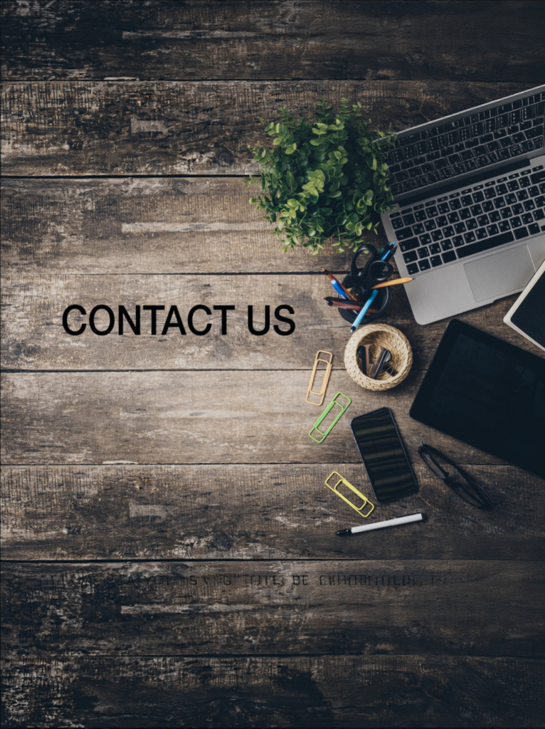 Desktop with laptop and phone prompting drivers to contact QG Auto Electrical in Stafford, Brisbane.